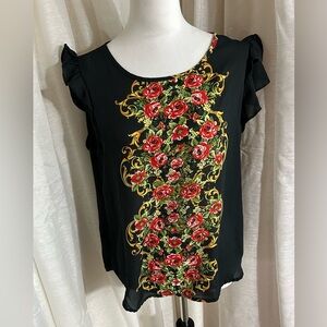 Cute OLM shirt with ruffles on the sleeves and roses down the front and back.